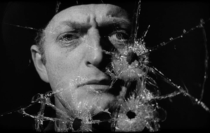 Noir mirrors: A broken world reflected in shattered glass